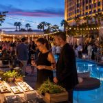 An upscale food and wine tasting beside a Las Vegas resort pool