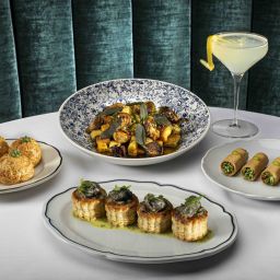 Chef prepared dishes and a craft cocktail for a Las Vegas culinary experience