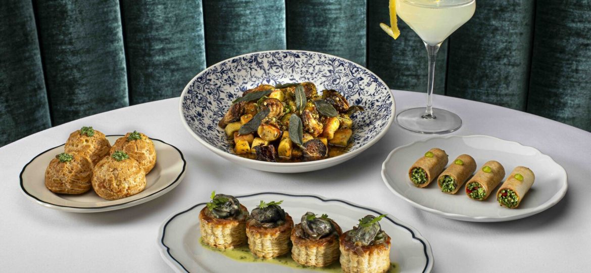 Chef prepared dishes and a craft cocktail for a Las Vegas culinary experience