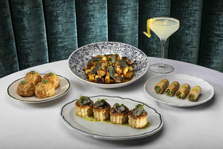 Chef prepared dishes and a craft cocktail for a Las Vegas culinary experience